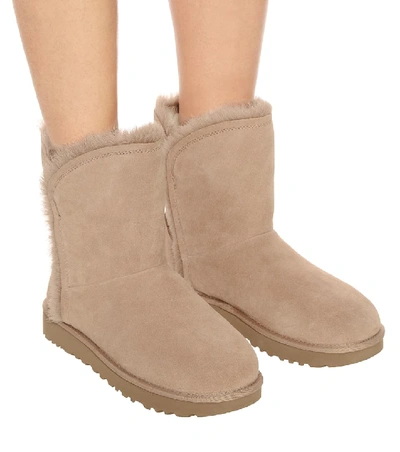 Shop Ugg Classic Short Suede Ankle Boots In Pink