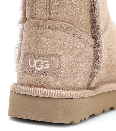 Shop Ugg Classic Short Suede Ankle Boots In Pink