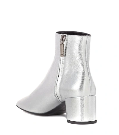 Shop Saint Laurent Loulou 50 Leather Ankle Boots In Silver