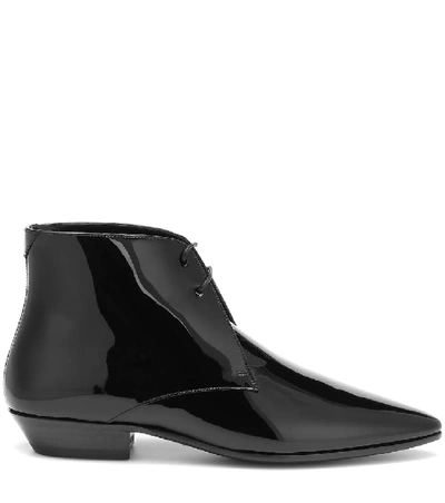 Shop Saint Laurent Jonas Patent Leather Ankle Boots In Black