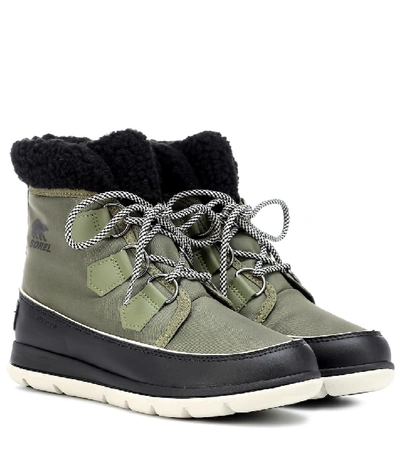 Shop Sorel Explorer Carnival Rubber Boots In Green