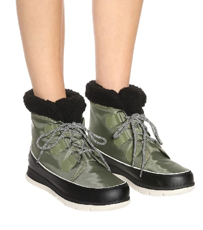 Shop Sorel Explorer Carnival Rubber Boots In Green