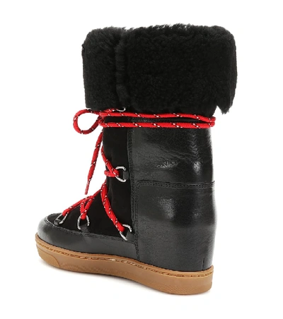 Shop Isabel Marant Nowly Shearling Ankle Boots In Black