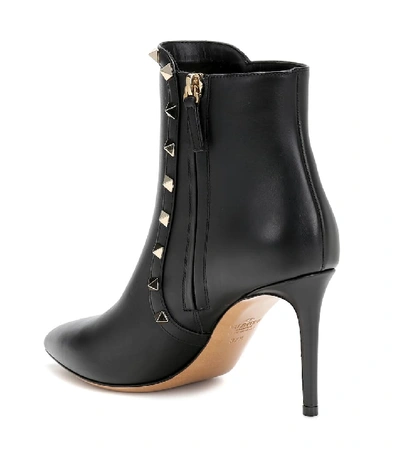 Shop Valentino Rockstud Leather Ankle Boots In Black