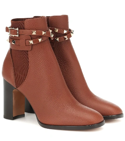 Shop Valentino Rockstud Leather Ankle Boots In Brown