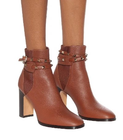 Shop Valentino Rockstud Leather Ankle Boots In Brown