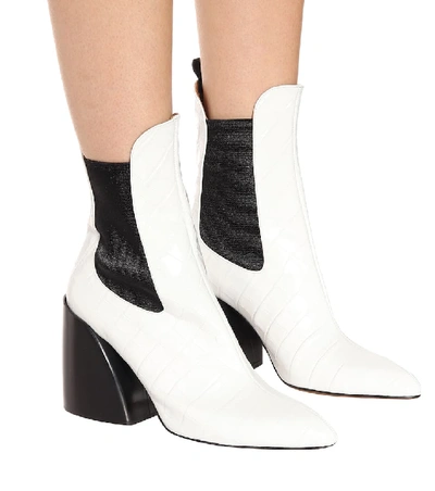 Shop Chloé Wave Leather Ankle Boots In White
