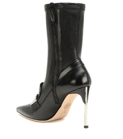 Shop Alexander Mcqueen Leather Ankle Boots In Black