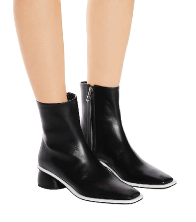 Shop Neous Sed Leather Ankle Boots In Black