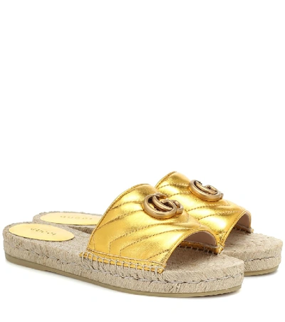 Shop Gucci Pilar Leather Slides In Gold