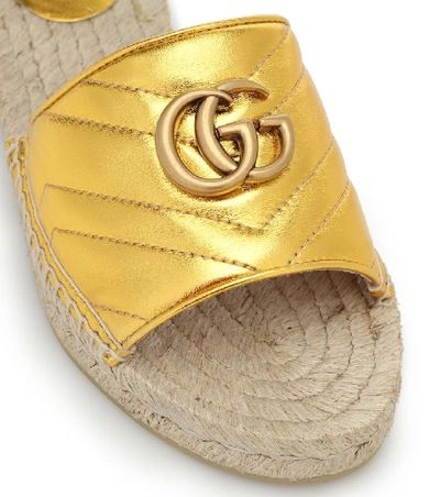 Shop Gucci Pilar Leather Slides In Gold