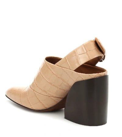 Shop Chloé Wave Embossed Leather Mules In Beige
