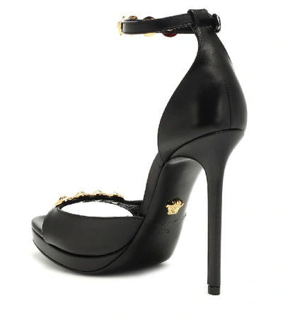 Shop Versace Embellished Leather Sandals In Black