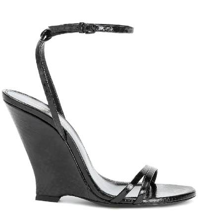 Shop Saint Laurent Kym Snakeskin Sandals In Black