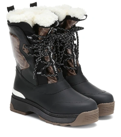 Shop Fendi T-rex Leather And Shearling Ankle Boots In Black