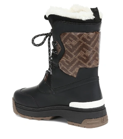 Shop Fendi T-rex Leather And Shearling Ankle Boots In Black