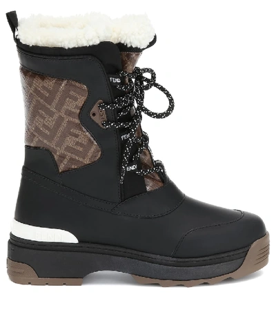 Shop Fendi T-rex Leather And Shearling Ankle Boots In Black
