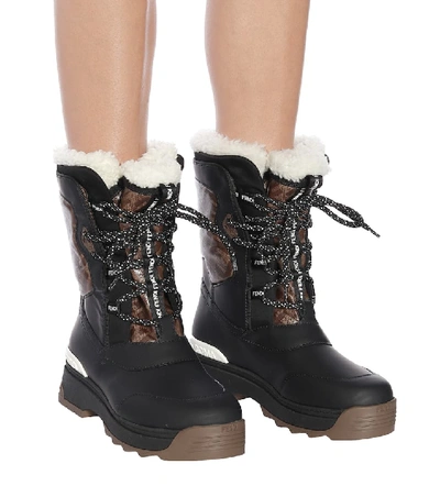 Shop Fendi T-rex Leather And Shearling Ankle Boots In Black