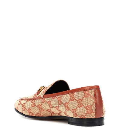 Shop Gucci Jordaan Gg Canvas Loafers In Beige