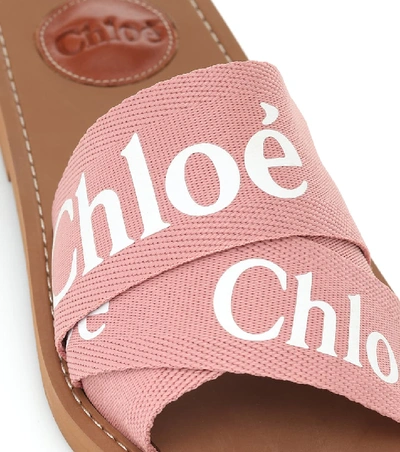 Shop Chloé Woody Canvas Slides In Pink