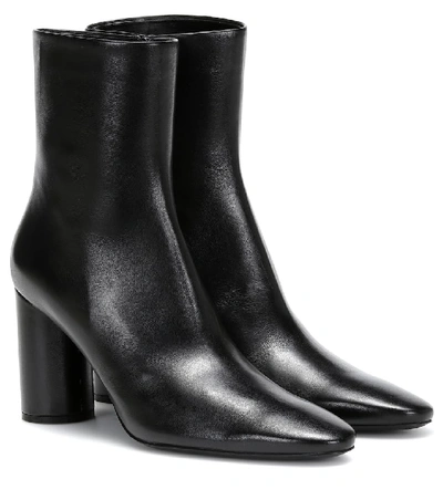 Shop Balenciaga Oval Leather Ankle Boots In Black