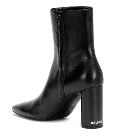 Shop Balenciaga Oval Leather Ankle Boots In Black