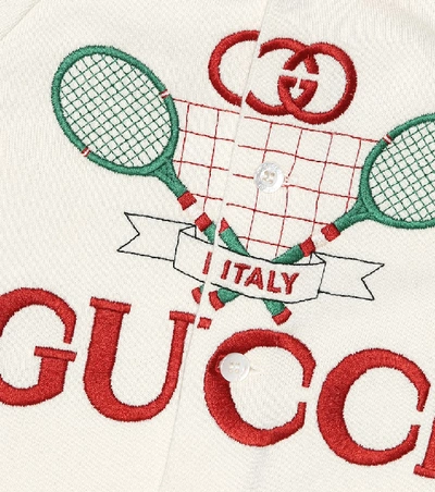 Shop Gucci Embroidered Cotton Onesie In White