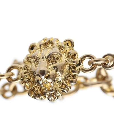 Shop Gucci Lion Metal Bracelet In Gold