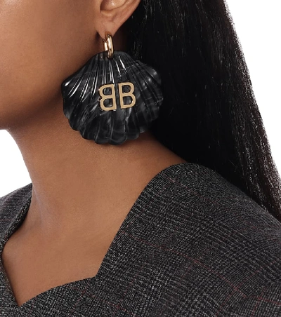 Shop Balenciaga Shell Earrings In Black