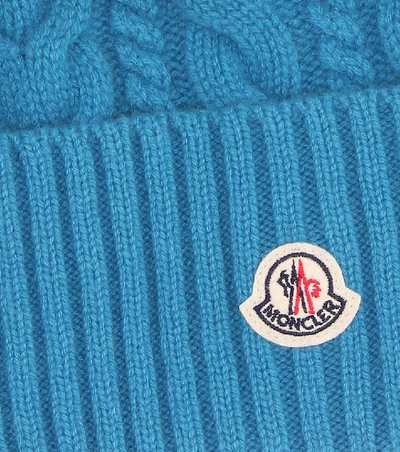 Shop Moncler Fur-trimmed Wool-blend Beanie In Blue