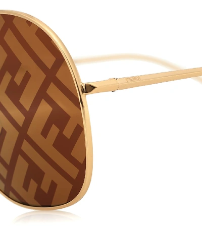 Shop Fendi Ff Family Aviator Sunglasses In Gold