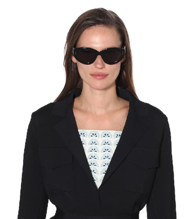 Shop Alaïa Cat-eye Sunglasses In Black