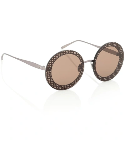 Shop Alaïa Round Sunglasses In Brown