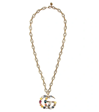 Shop Gucci Crystal Logo Pendant Necklace In Gold