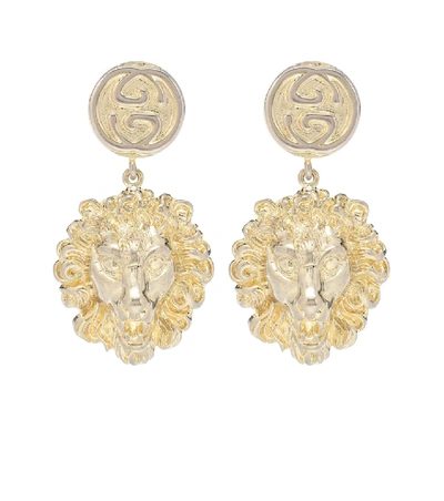 Shop Gucci Lion Earrings In Gold