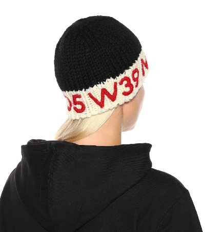Shop Calvin Klein 205w39nyc Knitted Wool Beanie In Black