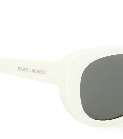 Shop Saint Laurent Betty Oval Sunglasses In White