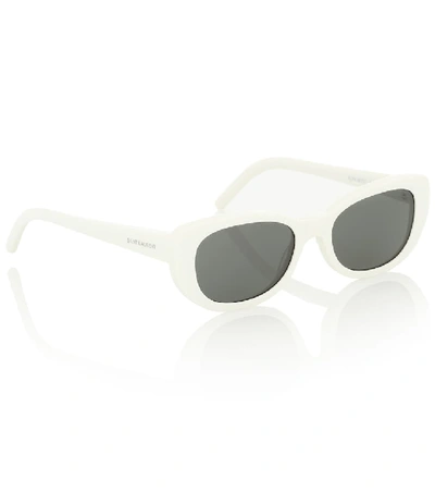 Shop Saint Laurent Betty Oval Sunglasses In White