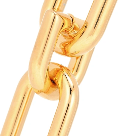 Shop Balenciaga Brass Earrings In Gold
