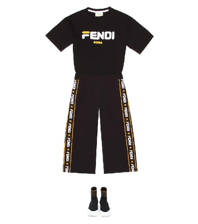Shop Fendi Mania Tech Trackpants In Black