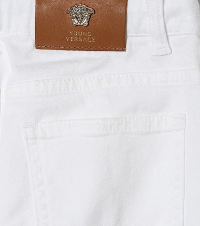 Shop Versace Straight Stretch-cotton Jeans In White