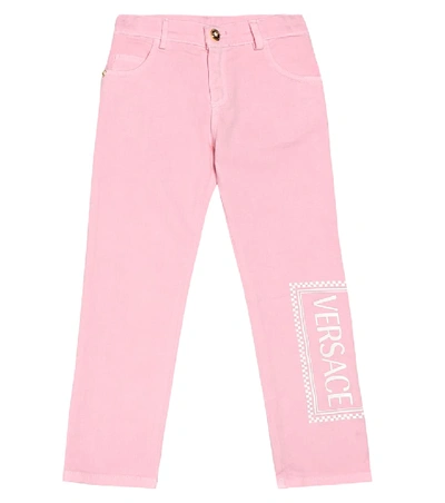 Shop Versace Logo Stretch Jeans In Pink