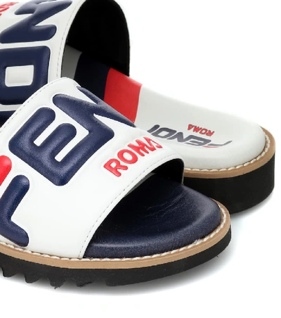 Shop Fendi Mania Leather Slides In White