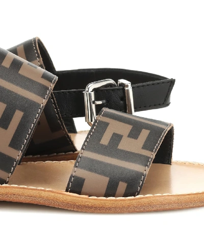 Shop Fendi Logo Leather Sandals In Brown