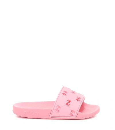 Shop Gucci Gg Embossed Rubber Slides In Pink