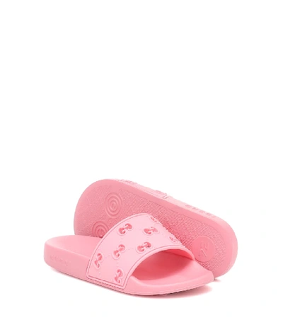 Shop Gucci Gg Embossed Rubber Slides In Pink