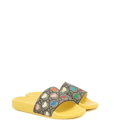 Shop Gucci Gg Heart Rubber Slides In Multicoloured