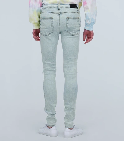 Shop Amiri Tie Dye Mx1 Jeans In Blue