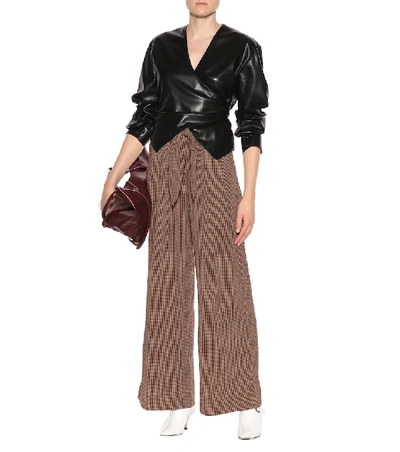 Shop Nanushka Nevada Checked Pants In Brown