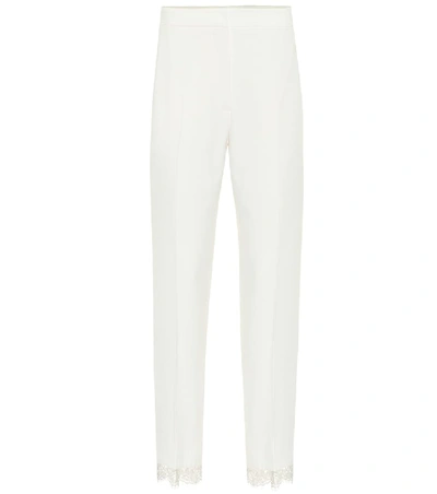 Shop Alexander Mcqueen Lace-trimmed Crêpe Cigarette Pants In White